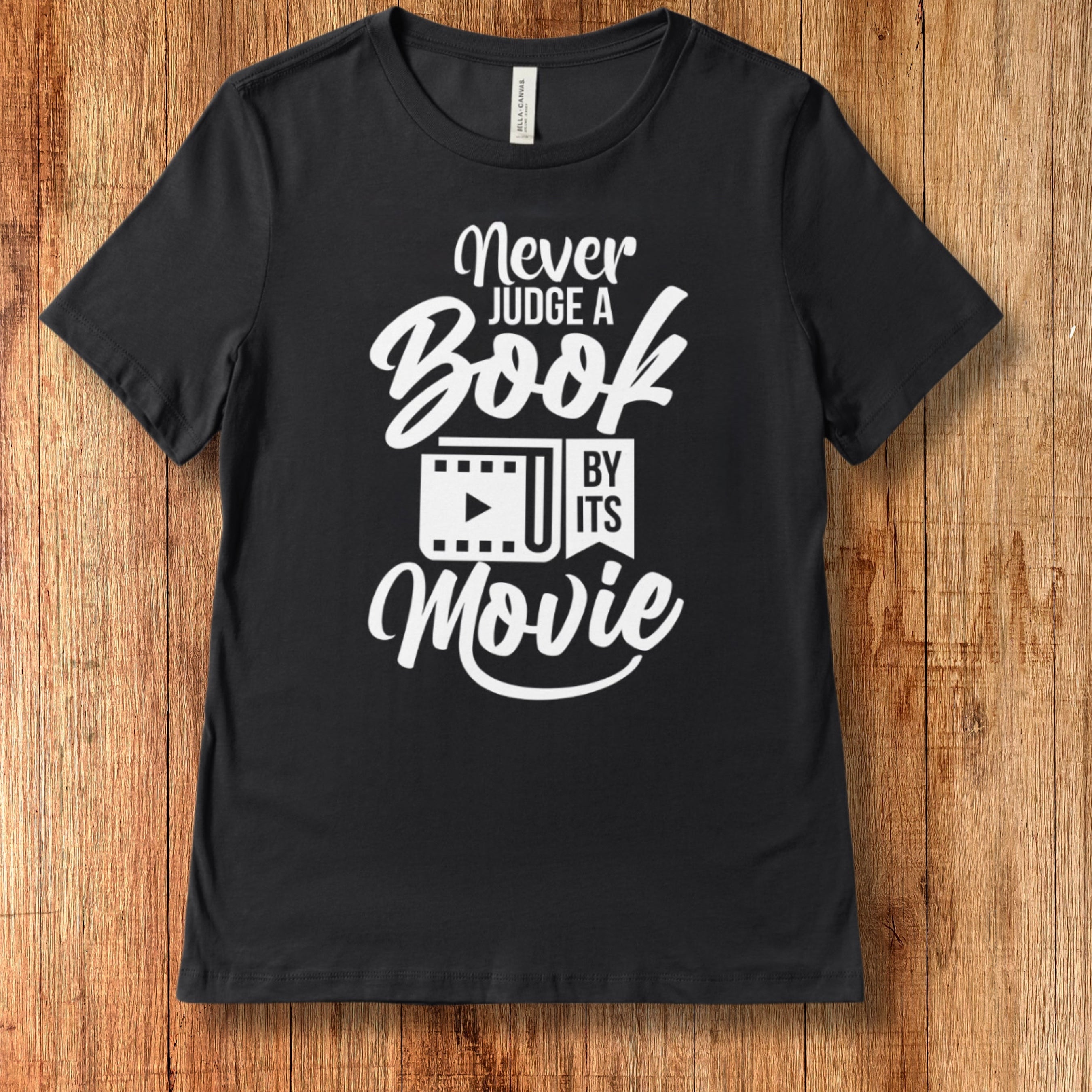 A Book by it’s Movie Tee